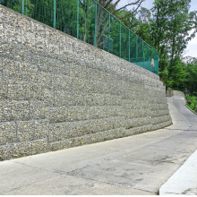 Galvanized gabion wall, hot-dip galvanized hexagonal woven gabion cage. Flood control retaining wall